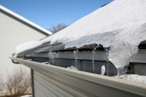 bigstock-Ice-on-roof-and-gutters-52324966