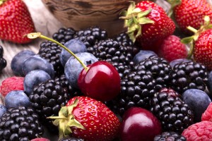 Tasty Summer Fruits On A Wooden Table