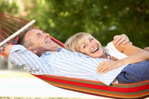 Senior Couple Relaxing In Hammock