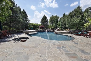 Swimming Pool With Large Stone Patio