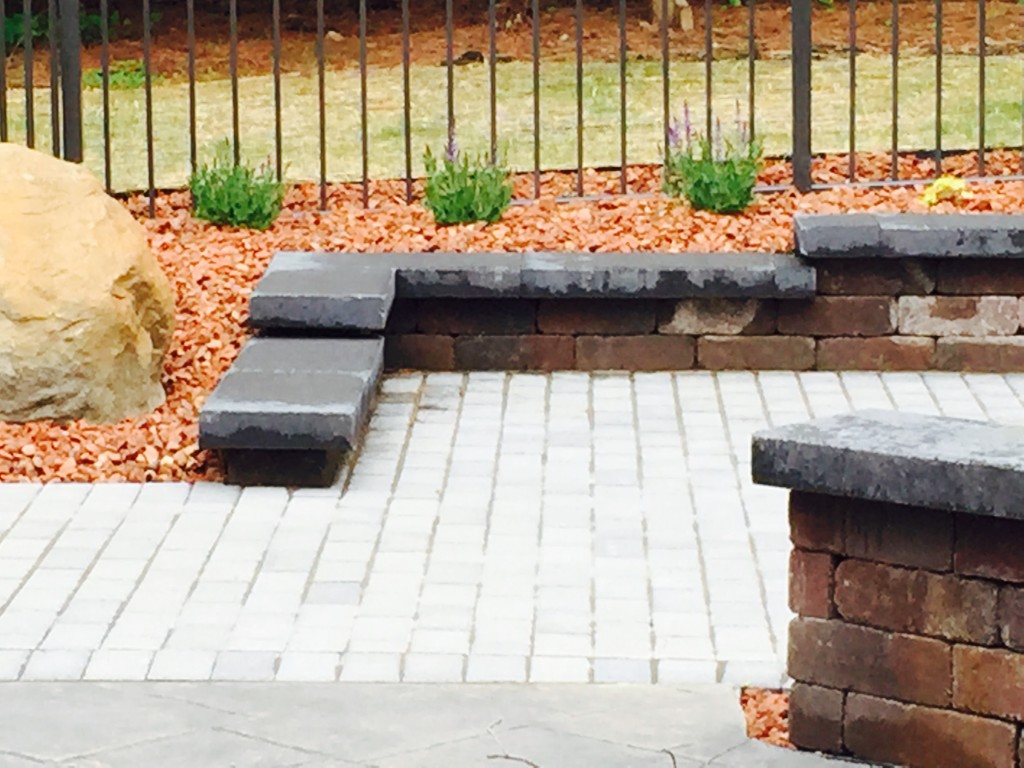 Stone Toped Wall With Patio