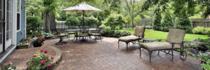 Outdoor Living Space with beautiful paver patio and professional landscape.