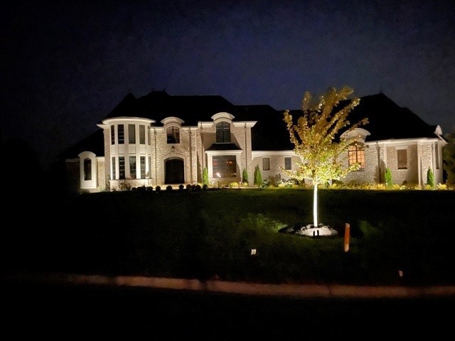 Luxury home at night.