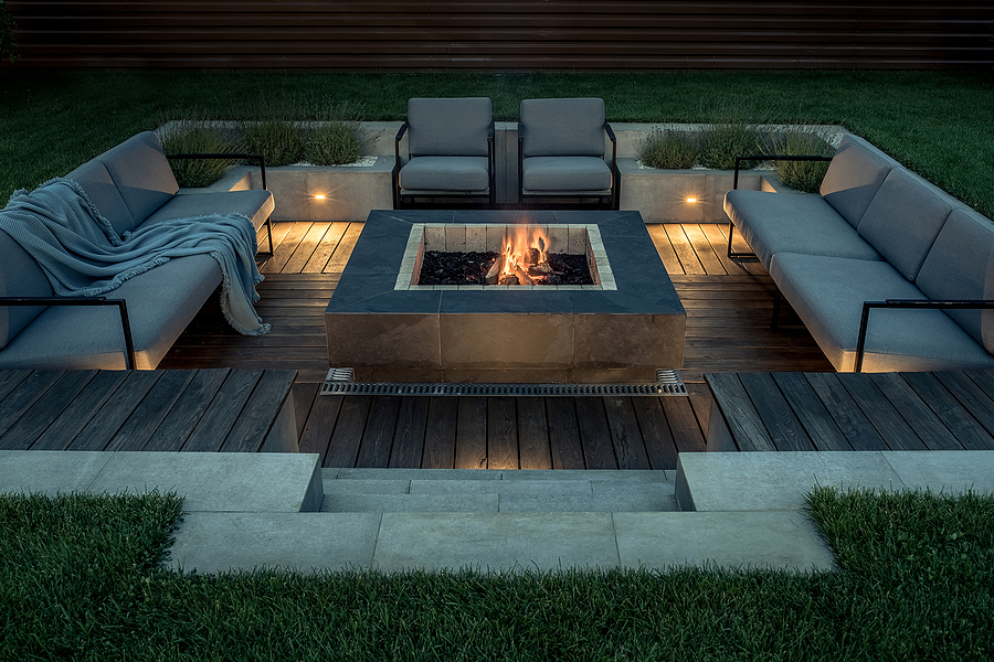 Modern outdoor living space with cozy fire pit.