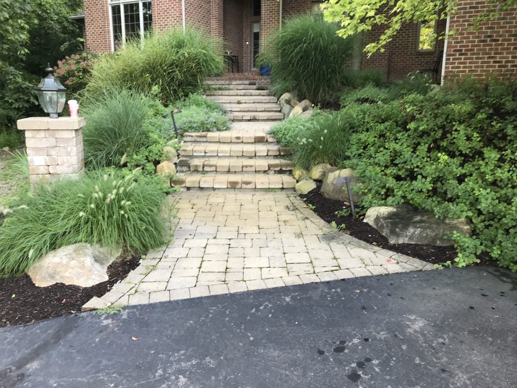 Beige-brick-paver-Walkway-with-steps-toward-a-home-in-Ann-Arbor