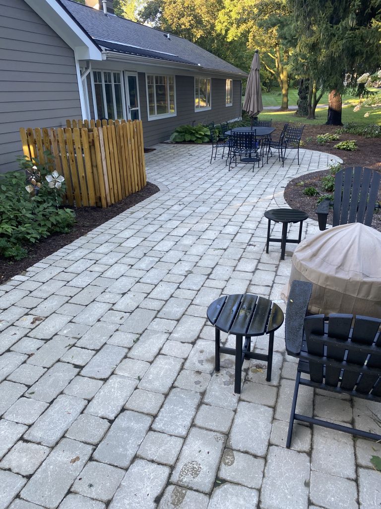 Small backyard paver patio in Ann Arbor