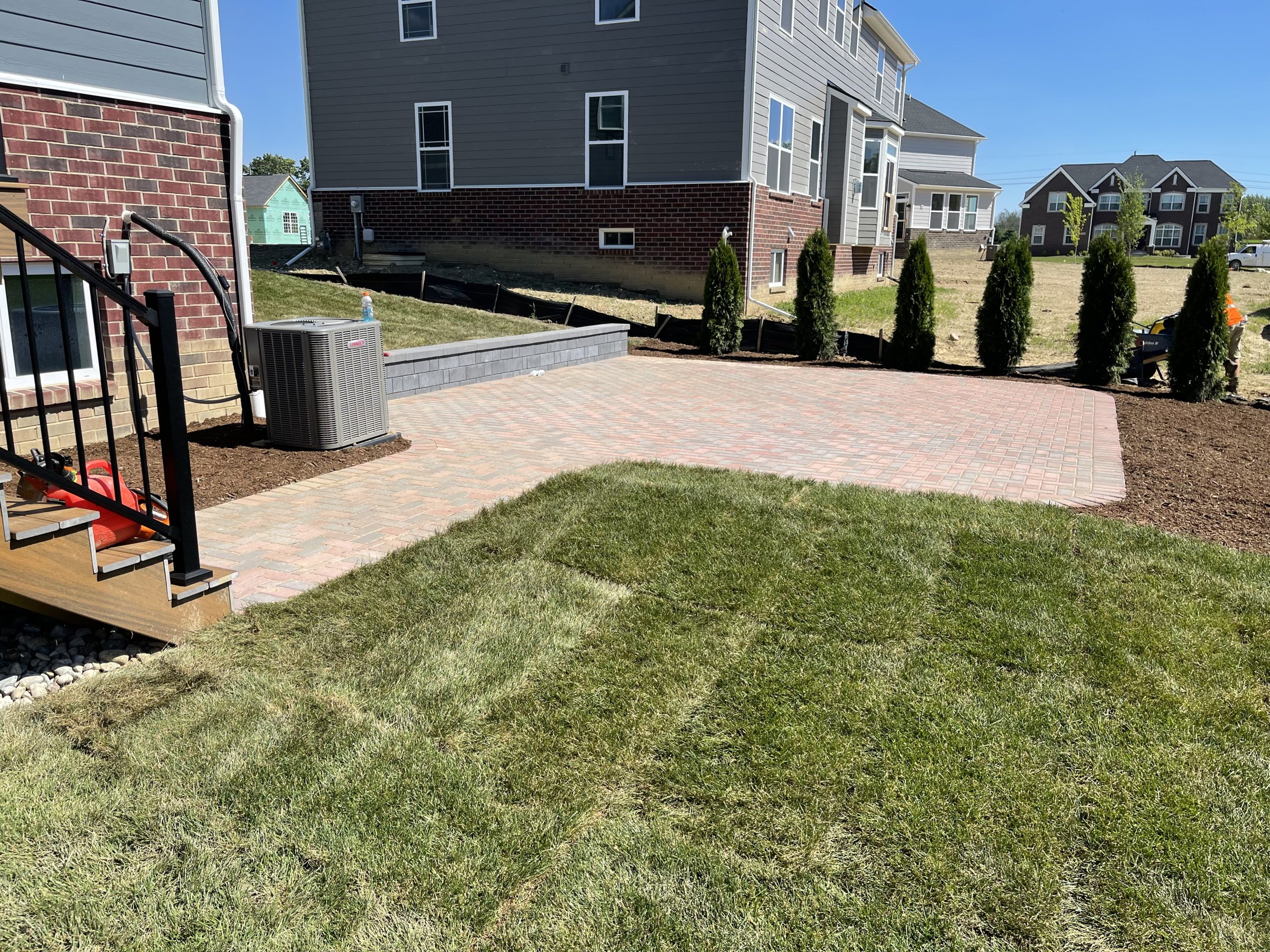 Paver patio after sod installation.