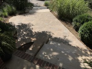 redesigned front door walkway landscaping